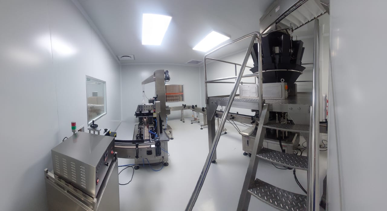 Gummy depositing and production line for white-label nutraceutical manufacturing.